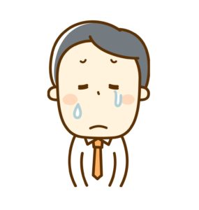 悲しい顔のビジネスマン
